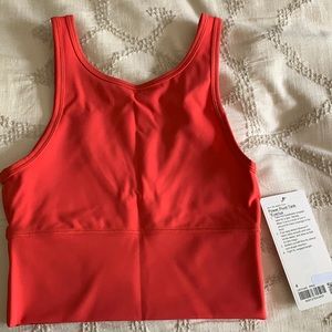 Power Pivot Tank Top 
Everlux - Pink Punch